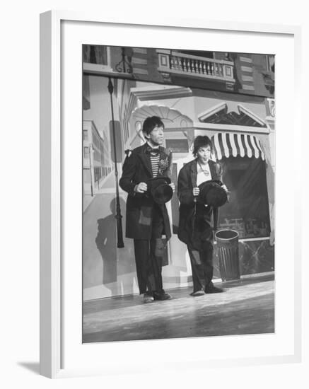 Scene from Film "Easter Parade," with Fred Astair and Judy Garland, Both Dressed as Hoboes-Allan Grant-Framed Premium Photographic Print