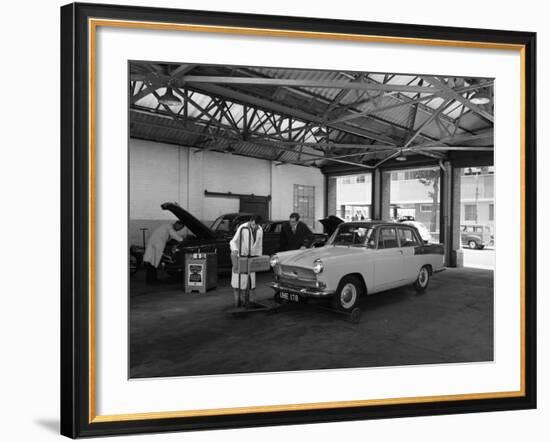 Scene in Globe and Simpsons Auto Electrical Workshop, Nottingham, Nottinghamshire, 1961-Michael Walters-Framed Photographic Print