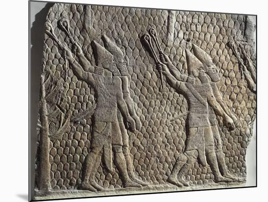 Scene with Assyrian Soldiers Armed with Slings, Relief from Royal Palaces of Nineveh-null-Mounted Giclee Print