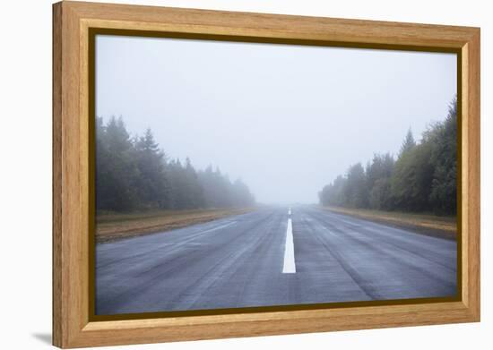 Scenic Image Of A Airplane Runway On The Oregon Coast-Justin Bailie-Framed Premier Image Canvas