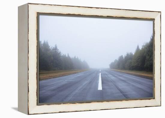 Scenic Image Of A Airplane Runway On The Oregon Coast-Justin Bailie-Framed Premier Image Canvas