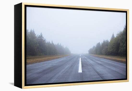 Scenic Image Of A Airplane Runway On The Oregon Coast-Justin Bailie-Framed Premier Image Canvas