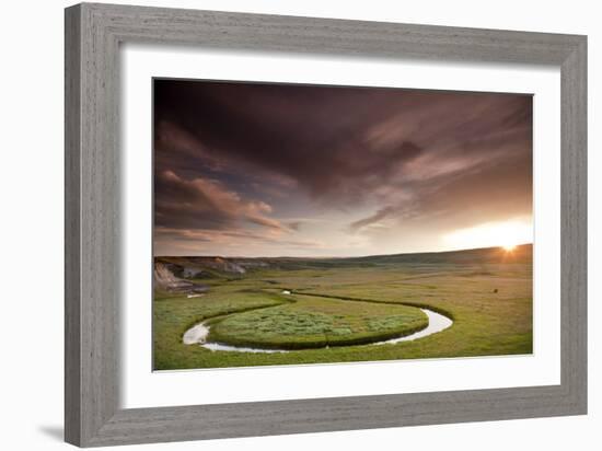 Scenic Shot Of The Sunset And A Bison Grazing Alongside A Circular Stream In Yellowstone NP, WY-Karine Aigner-Framed Photographic Print