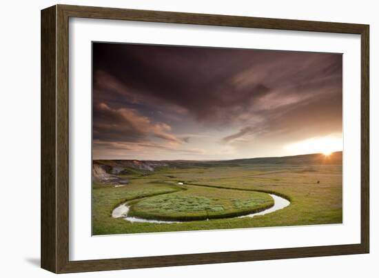 Scenic Shot Of The Sunset And A Bison Grazing Alongside A Circular Stream In Yellowstone NP, WY-Karine Aigner-Framed Photographic Print