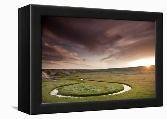 Scenic Shot Of The Sunset And A Bison Grazing Alongside A Circular Stream In Yellowstone NP, WY-Karine Aigner-Framed Premier Image Canvas