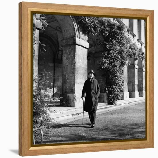 Scholar C.S. Lewis Walking with Cane Near Building at Magdalen College, Oxford University-Hans Wild-Framed Premier Image Canvas