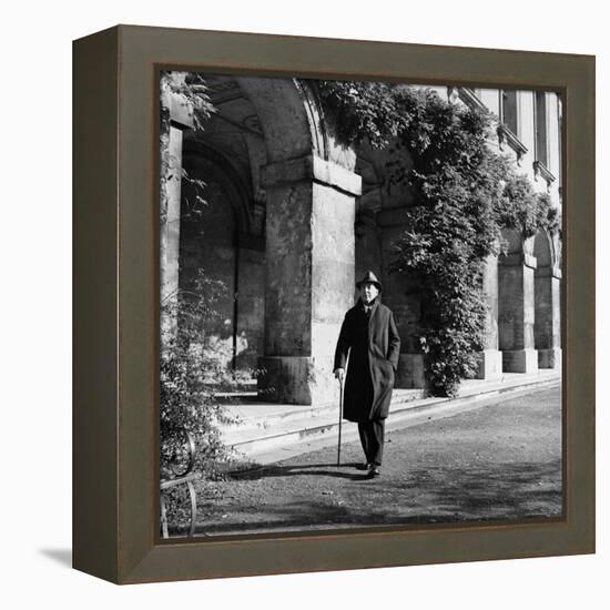 Scholar C.S. Lewis Walking with Cane Near Building at Magdalen College, Oxford University-Hans Wild-Framed Premier Image Canvas