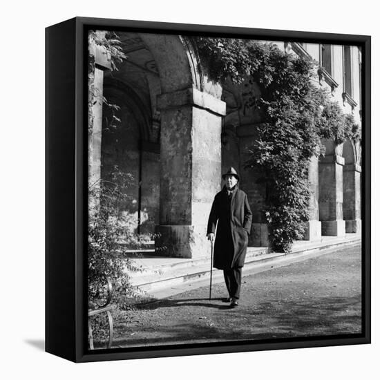 Scholar C.S. Lewis Walking with Cane Near Building at Magdalen College, Oxford University-Hans Wild-Framed Premier Image Canvas