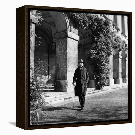 Scholar C.S. Lewis Walking with Cane Near Building at Magdalen College, Oxford University-Hans Wild-Framed Premier Image Canvas