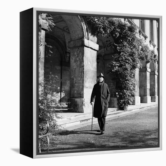 Scholar C.S. Lewis Walking with Cane Near Building at Magdalen College, Oxford University-Hans Wild-Framed Premier Image Canvas