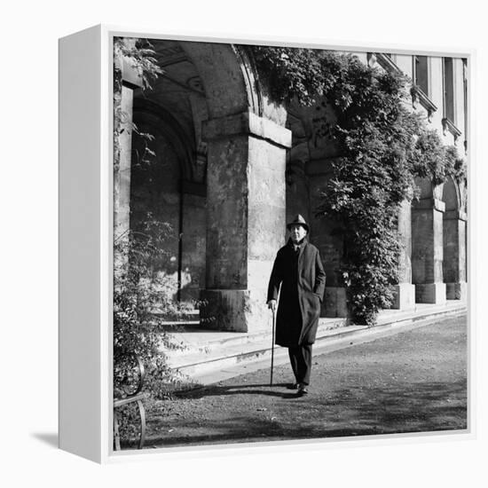 Scholar C.S. Lewis Walking with Cane Near Building at Magdalen College, Oxford University-Hans Wild-Framed Premier Image Canvas