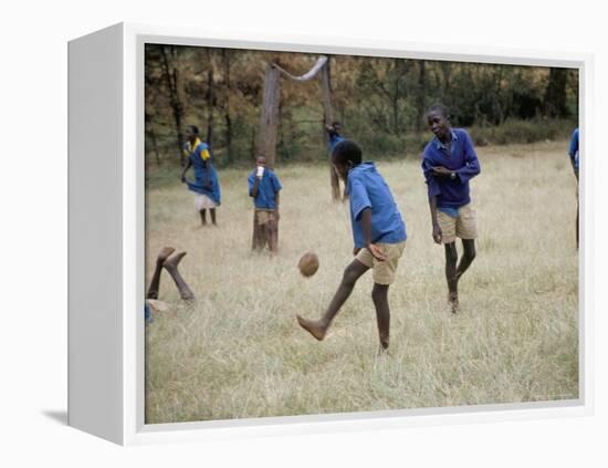 School Children Playing Football, Western Area, Kenya, East Africa, Africa-Liba Taylor-Framed Premier Image Canvas