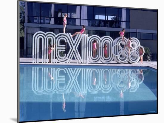 School Children Playing on Olympic Logo "Mexico 68" Beside Pool-John Dominis-Mounted Photographic Print