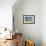 School Desk in Field, Michigan-Paul Souders-Framed Photographic Print displayed on a wall