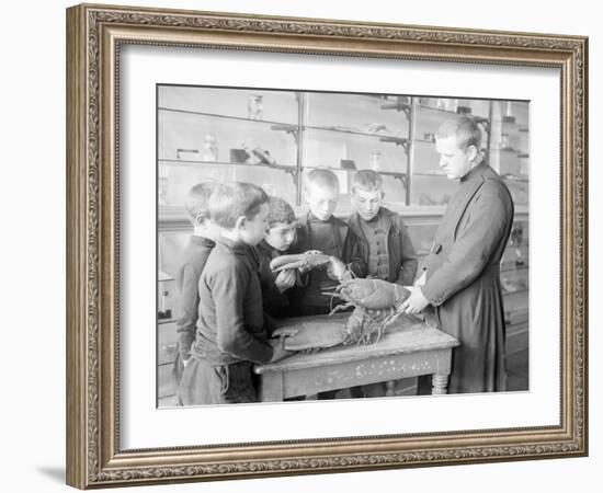 School For Fishing: Monk Shows How to Handle a Lobster, 20th Century-Andrew Pitcairn-knowles-Framed Giclee Print