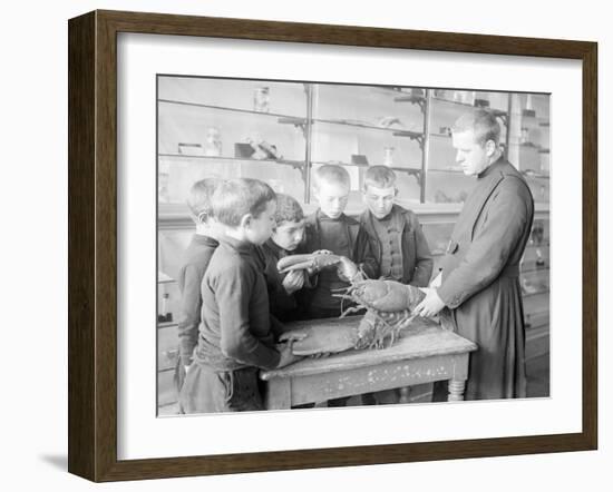 School For Fishing: Monk Shows How to Handle a Lobster, 20th Century-Andrew Pitcairn-knowles-Framed Giclee Print