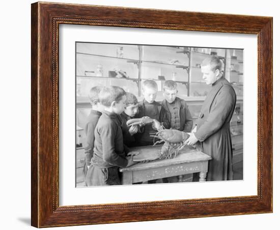 School For Fishing: Monk Shows How to Handle a Lobster, 20th Century-Andrew Pitcairn-knowles-Framed Giclee Print