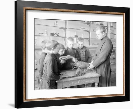 School For Fishing: Monk Shows How to Handle a Lobster, 20th Century-Andrew Pitcairn-knowles-Framed Giclee Print