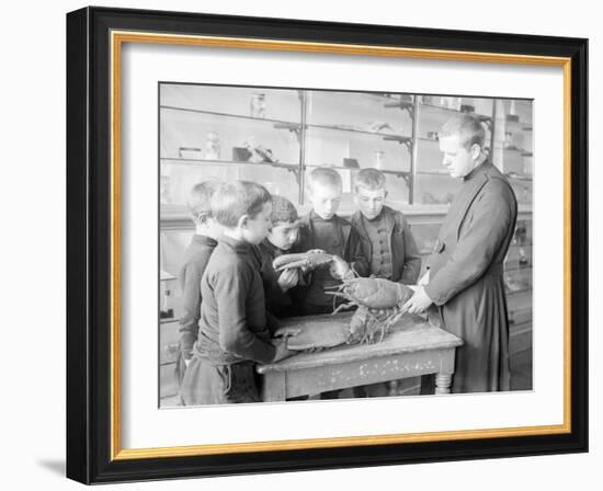 School For Fishing: Monk Shows How to Handle a Lobster, 20th Century-Andrew Pitcairn-knowles-Framed Giclee Print