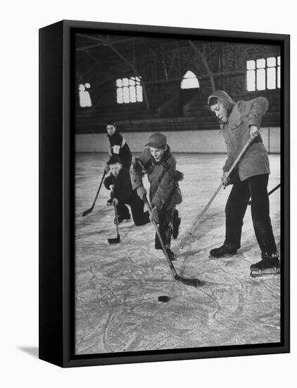 Schoolboys Playing Ice Hockey-null-Framed Premier Image Canvas