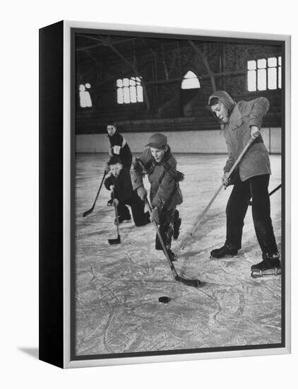 Schoolboys Playing Ice Hockey-null-Framed Premier Image Canvas