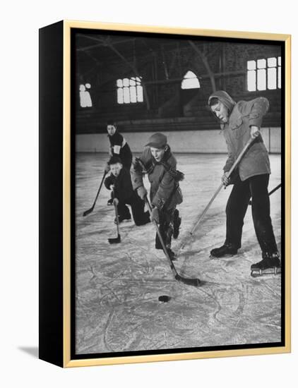Schoolboys Playing Ice Hockey-null-Framed Premier Image Canvas