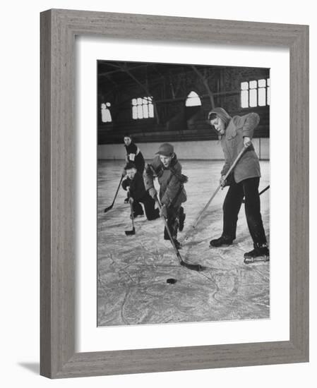 Schoolboys Playing Ice Hockey-null-Framed Photographic Print