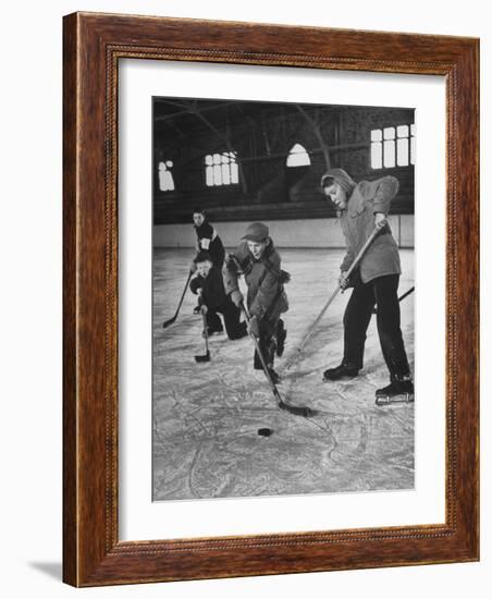 Schoolboys Playing Ice Hockey-null-Framed Photographic Print