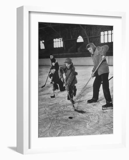 Schoolboys Playing Ice Hockey-null-Framed Photographic Print