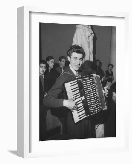 Science Student Playing the Accordian-Ed Clark-Framed Photographic Print