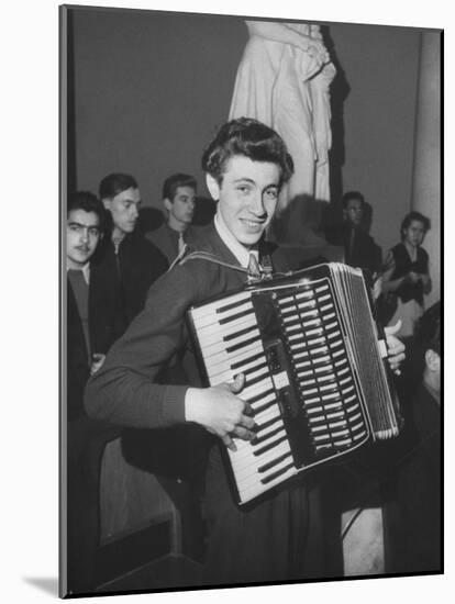 Science Student Playing the Accordian-Ed Clark-Mounted Photographic Print