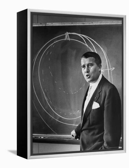 Scientist Dr. Wernher Von Braun Standing Explains Theory of Satellite Flight at Redstone Missile Hz-Walter Sanders-Framed Premier Image Canvas