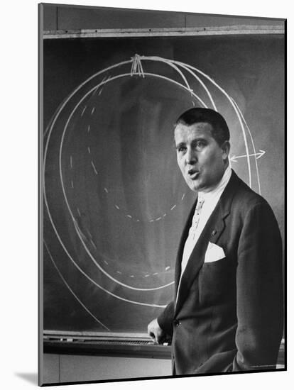 Scientist Dr. Wernher Von Braun Standing Explains Theory of Satellite Flight at Redstone Missile Hz-Walter Sanders-Mounted Premium Photographic Print