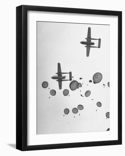 Scores of Paratroopers Dropping from C-82 "Flying Boxcar" and Landing on Level Ground-Frank Scherschel-Framed Photographic Print