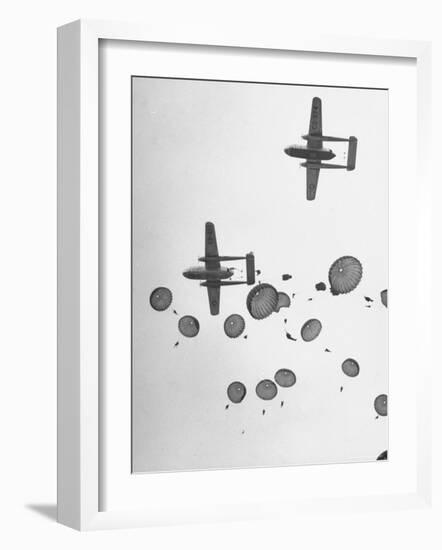 Scores of Paratroopers Dropping from C-82 "Flying Boxcar" and Landing on Level Ground-Frank Scherschel-Framed Photographic Print