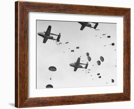 Scores of Paratroopers Dropping from C-82 "Flying Boxcar" and Landing on Level Ground-Frank Scherschel-Framed Photographic Print