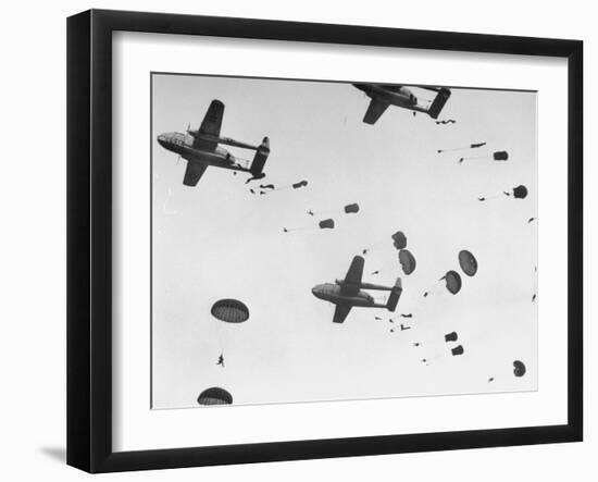 Scores of Paratroopers Dropping from C-82 "Flying Boxcar" and Landing on Level Ground-Frank Scherschel-Framed Photographic Print