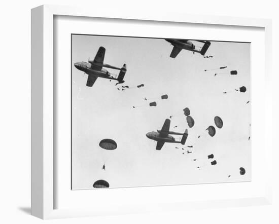 Scores of Paratroopers Dropping from C-82 "Flying Boxcar" and Landing on Level Ground-Frank Scherschel-Framed Photographic Print