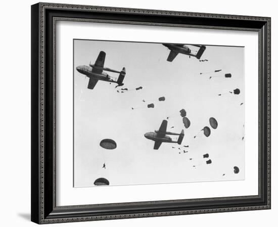 Scores of Paratroopers Dropping from C-82 "Flying Boxcar" and Landing on Level Ground-Frank Scherschel-Framed Photographic Print