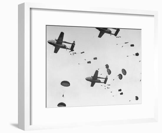 Scores of Paratroopers Dropping from C-82 "Flying Boxcar" and Landing on Level Ground-Frank Scherschel-Framed Photographic Print