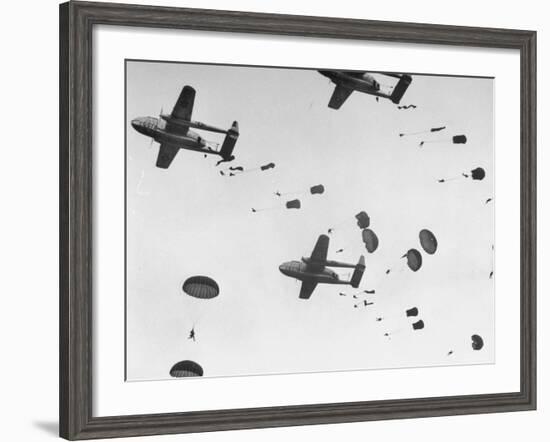 Scores of Paratroopers Dropping from C-82 "Flying Boxcar" and Landing on Level Ground-Frank Scherschel-Framed Photographic Print