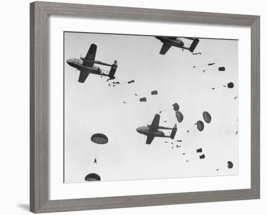 Scores of Paratroopers Dropping from C-82 "Flying Boxcar" and Landing on Level Ground-Frank Scherschel-Framed Photographic Print