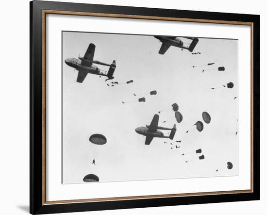 Scores of Paratroopers Dropping from C-82 "Flying Boxcar" and Landing on Level Ground-Frank Scherschel-Framed Photographic Print