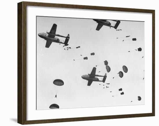 Scores of Paratroopers Dropping from C-82 "Flying Boxcar" and Landing on Level Ground-Frank Scherschel-Framed Photographic Print