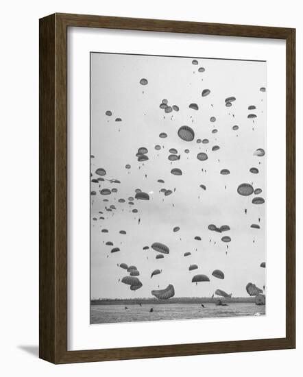 Scores of Paratroopers Dropping from C-82 "Flying Boxcar" and Landing on Level Ground-Frank Scherschel-Framed Photographic Print