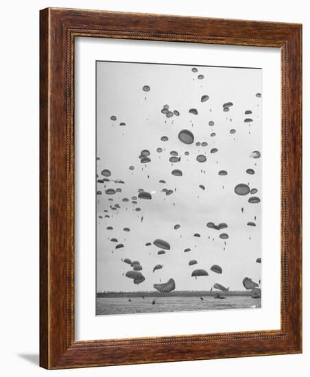 Scores of Paratroopers Dropping from C-82 "Flying Boxcar" and Landing on Level Ground-Frank Scherschel-Framed Photographic Print