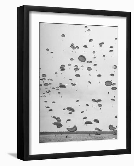 Scores of Paratroopers Dropping from C-82 "Flying Boxcar" and Landing on Level Ground-Frank Scherschel-Framed Photographic Print