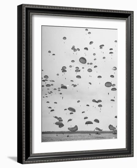 Scores of Paratroopers Dropping from C-82 "Flying Boxcar" and Landing on Level Ground-Frank Scherschel-Framed Photographic Print