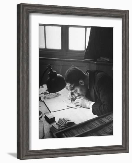 Scotland Yard Fingerprint Expert Working in the Scenes of Crime Search Room-David Scherman-Framed Photographic Print