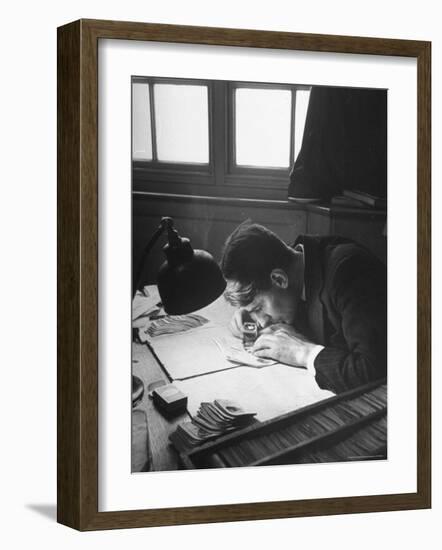 Scotland Yard Fingerprint Expert Working in the Scenes of Crime Search Room-David Scherman-Framed Photographic Print